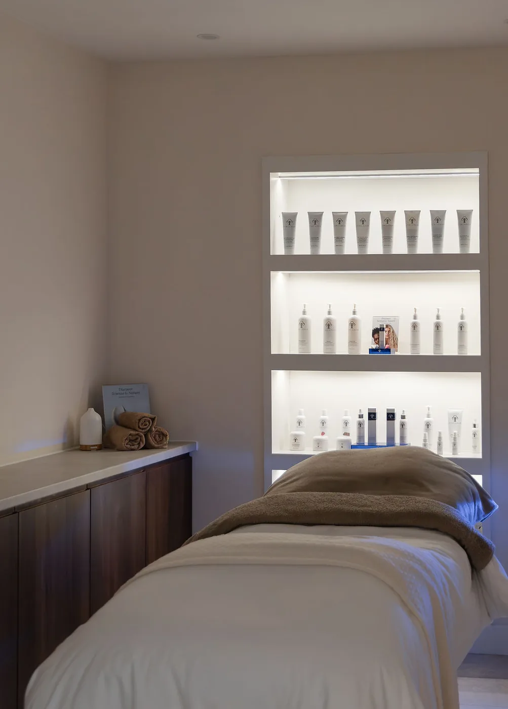 A calm, minimal treatment room at The Skin Lounge Bristol